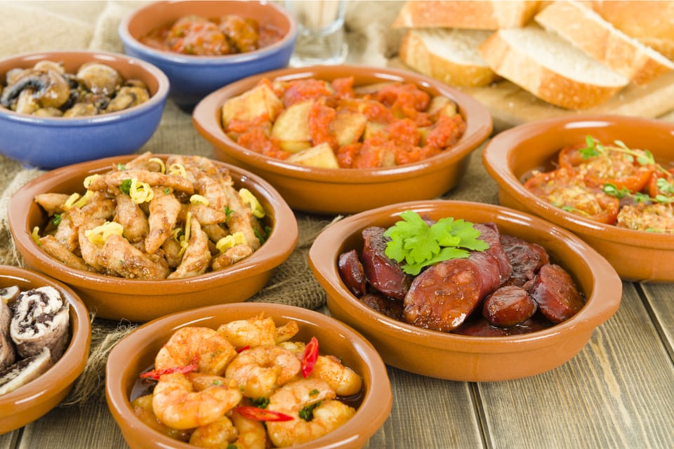 Barcelona: 3-Hour Bike Tour with Spanish Tapas - Tapas in the City Center: Wine, Cava, and the Right Kind of Ending
