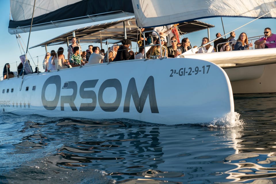 Barcelona: Catamaran Cruise with optional Live Jazz Music - The Boat Experience: Netting, Sun, and That Open-Water Energy