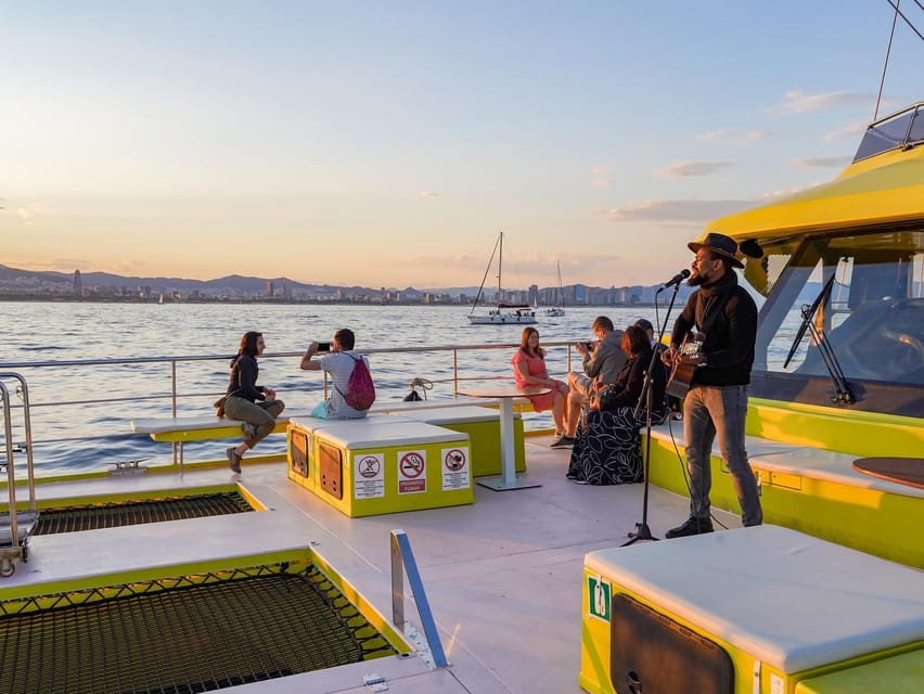 Barcelona: Daytime or Sunset Catamaran Cruise with Music - Drinks, snacks, and the real value of paying $15