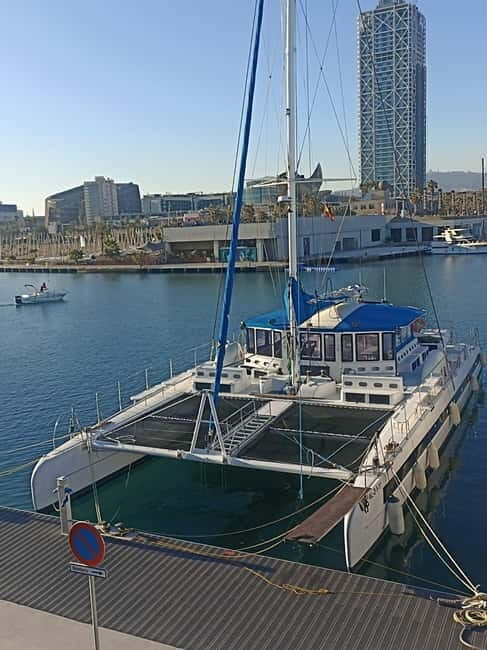 Barcelona: Daytime or Sunset Cruise with Drinks - Onboard comfort: drinks, chill music, and the sailing experience