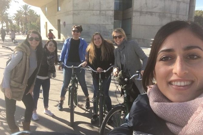 Barcelona Evening Small Group Bike Tour with Cava | with Private Option - Arc de Triomf and Parc de la Ciutadella: green space right after big monuments