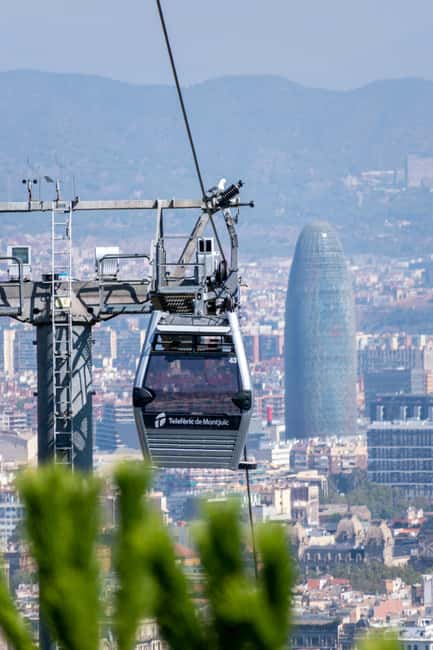 Barcelona from the heights to the sea: Montjuïc, Cable Car, and Beach - The cable car sweep: a short ride with big Barcelona energy