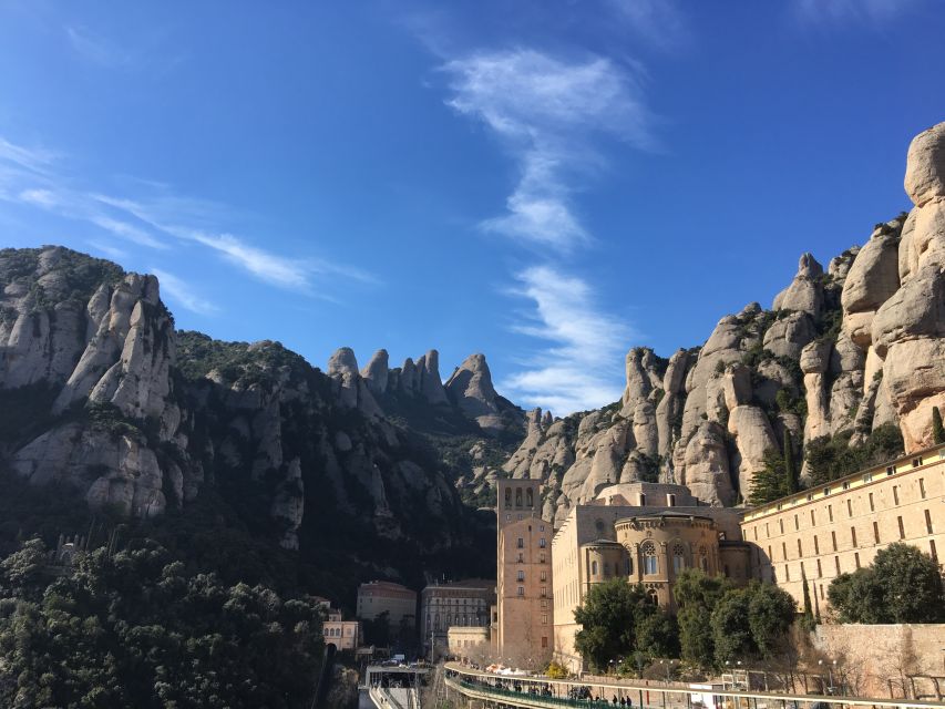 Barcelona: Half-Day Montserrat Monastery and Mountain Hike - Entering the Montserrat monastery: where La Moreneta anchors the visit