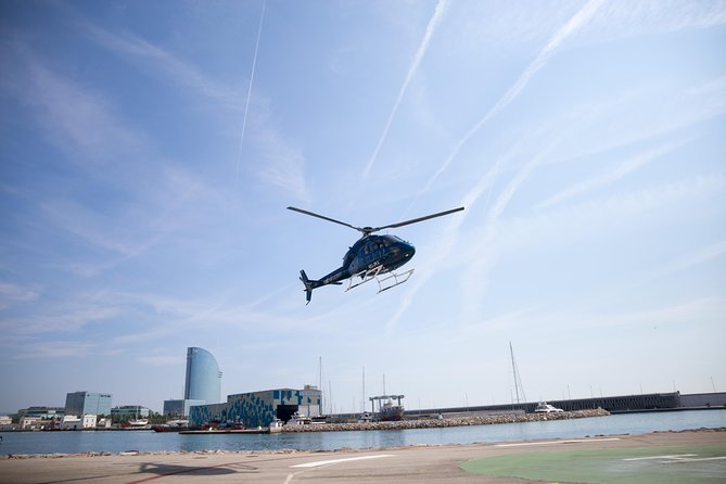 Barcelona Helicopter, Sailboat & Old Town Private Walking Tour - Heliport del Port de Barcelona: minivan ride, safety briefing, and short time aloft