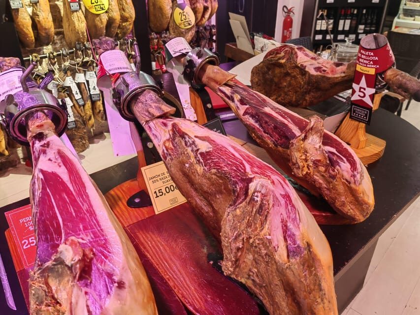 Barcelona: Local Market & Street Food Walking Tour - La Boqueria Market: 13th-century stalls and what to watch for