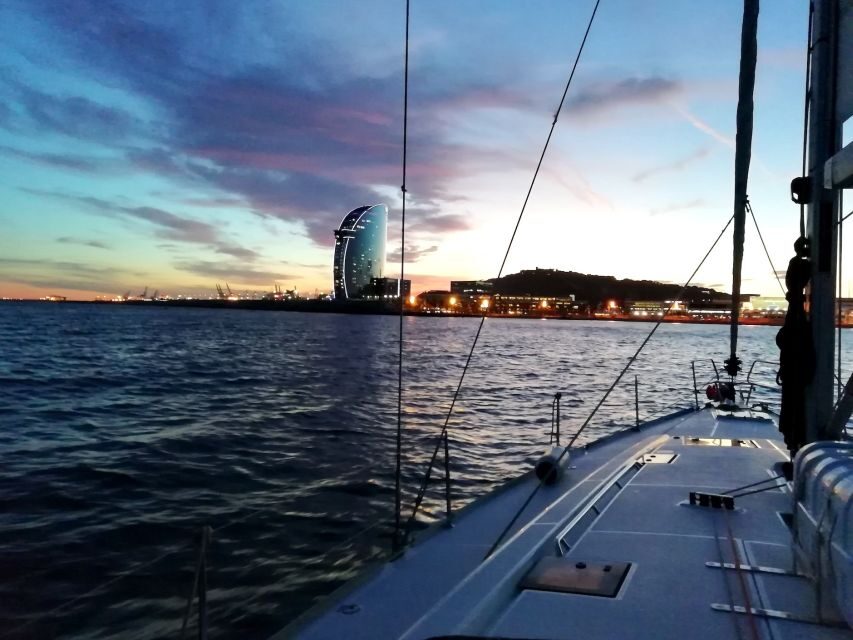 Barcelona: Luxury Private Sunset Yacht Cruise - Leaving Port Olímpic: the sea breeze hits fast
