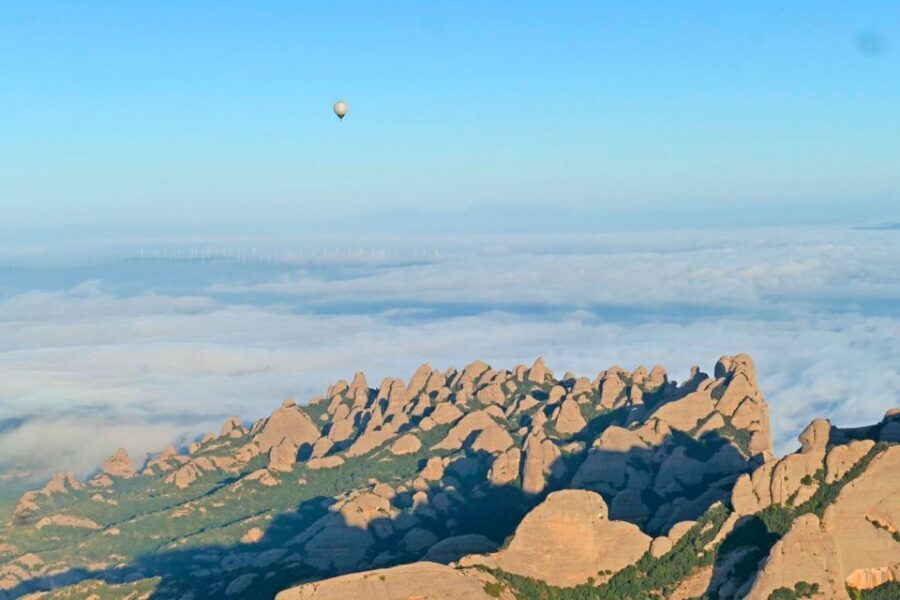 Barcelona: Montserrat Hot-Air Balloon & Monastery Experience - Cable car up to the monastery: From air to faith in minutes