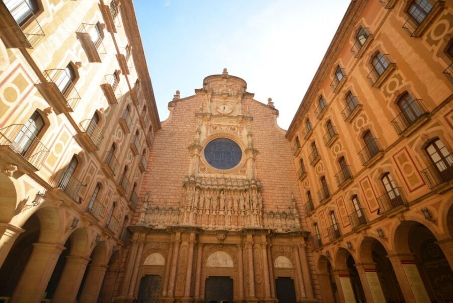 Barcelona: Montserrat & Sagrada Familia Guided Tour - Inside Montserrat Monastery: Madonna, atrium, sacristy, and monk-made licor