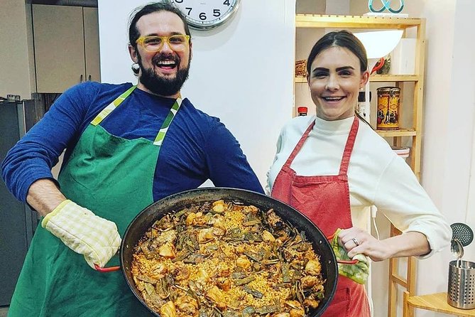 Barcelona : Paella Cooking Experience + Boqueria Market Exclusive Tour - Mercat de la Boqueria Stop: Seafood Shopping With a Plan