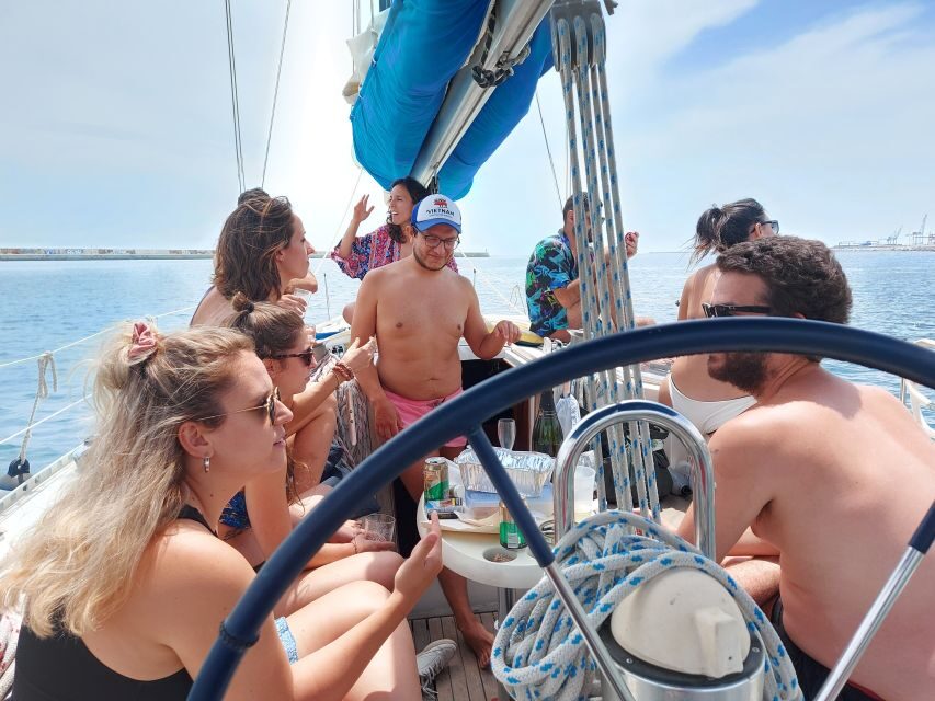 Barcelona Sailing Tour Drinks, snacks Swim & Stunning Views - The big sail-by sights: Sagrada Familia, Montjuïc, and the harbor skyline