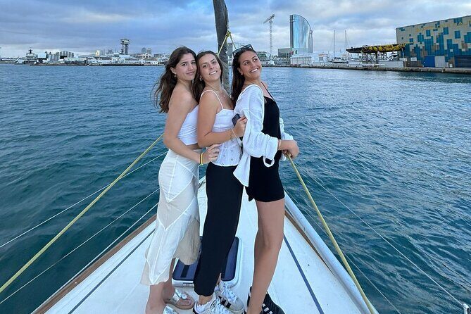 Barcelona: Sailing Tour with Tapas, Drinks, Swim & Sunset Option - Photos, Dolphins, and the Kind of Surprise You Can Expect