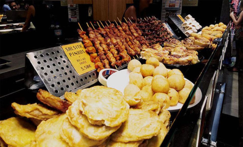 Barcelona: Street Food & Sightseeing Tour with Local Market - The Walk Through Historic Streets: Food + Place, Not Just Food