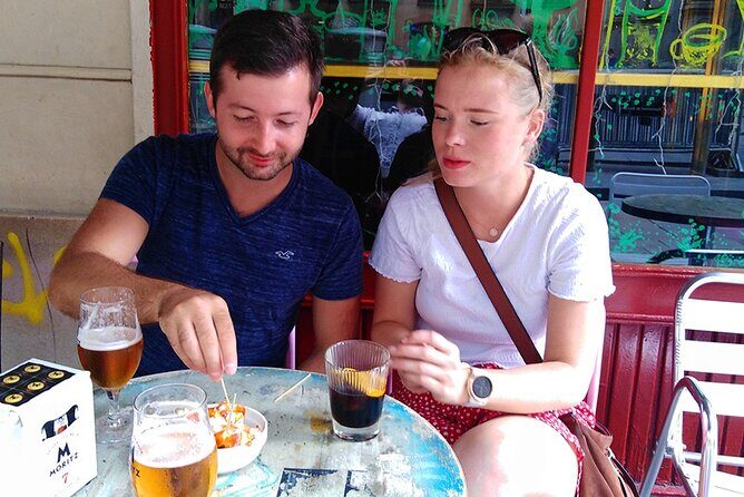 Barcelona Street Food Tour with Local Market & City Center Visit - Placa del Rei: Roman and royal leftovers, plus a dessert stop