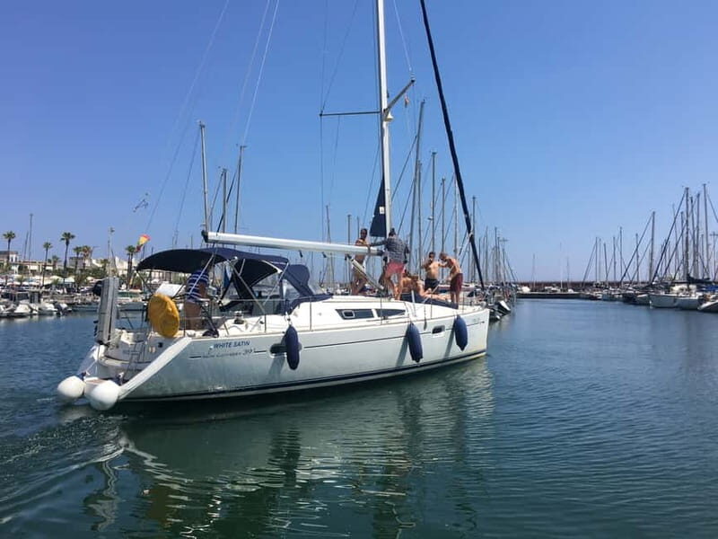 Barcelona: Sunset Boat Trip with Cava Wine and Snacks - Cava, snacks, and the onboard routine