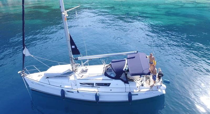 Barcelona: Sunset Boat Trip with Cava Wine and Snacks - Driving the boat: the fun factor that makes this memorable