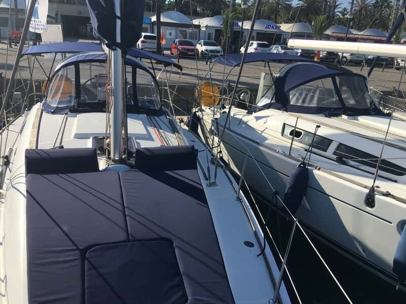 Barcelona: Sunset Boat Trip with Cava Wine and Snacks - Comfort on board: seating, blankets, and music
