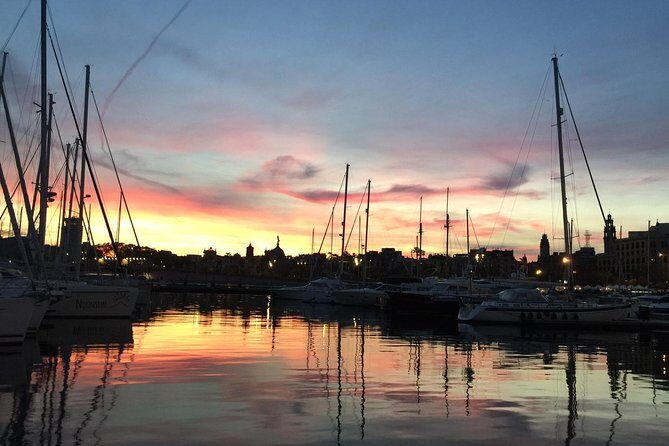 Barcelona Sunset Cruise with Light Snacks and Open Bar - Out to sea at sunset: skipper stories, sailboat calm, and a possible swim