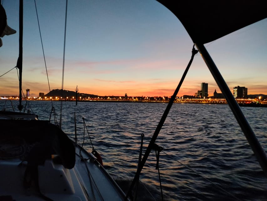 Barcelona: Sunset Cruise with Snacks and Drinks - Skipper energy and the guide language reality