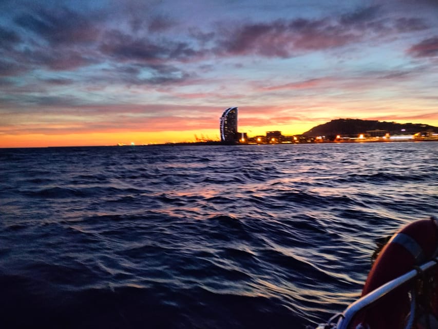 Barcelona: Sunset Cruise with Snacks and Drinks - The sea swim: refreshing, but pack for it