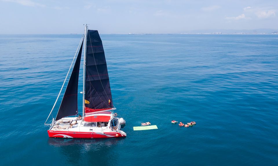 Barcelona: Sunset or Day Catamaran Cruise with Tapa & Drink - Your Included Tapa and Free Drink: Nice, But Plan Around It