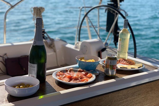 Barcelona Sunset Private Sailing with Light Snacks and Open Bar - Sights You’ll See: Columbus Monument, Sagrada Família, Tibidabo, and Montjuïc
