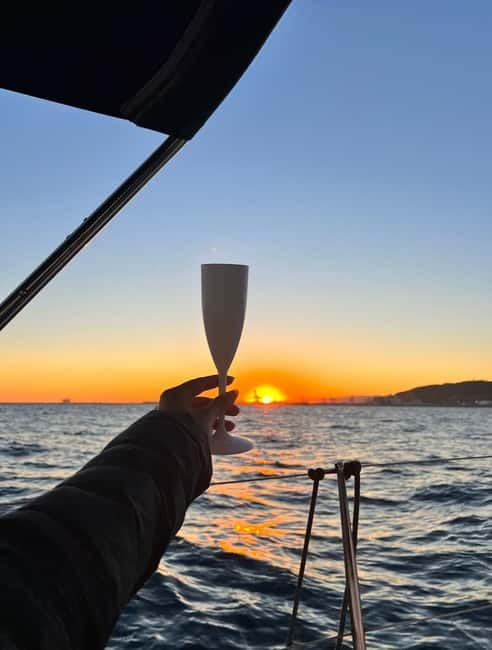 Barcelona: Sunset Sailboat Cruise with Open Bar and Snacks - Price and what you actually get for about $54