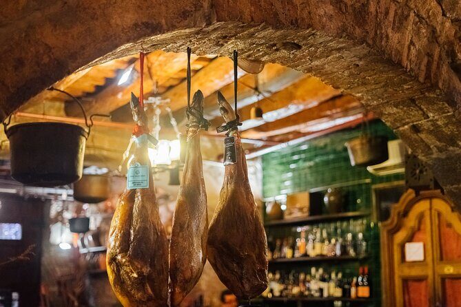Barcelona Tapas and Wine Private Walking Tour - Passeig del Colom: a breather and a boundary line