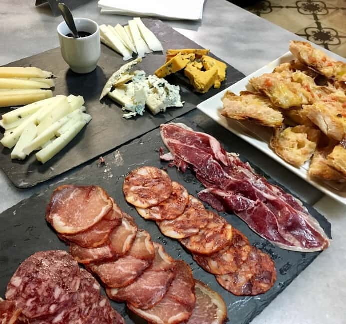 Barcelona: Tapas Crawl full meal & drinks all included - Four Stops, Four Stories: What You’ll Do at Each Bar