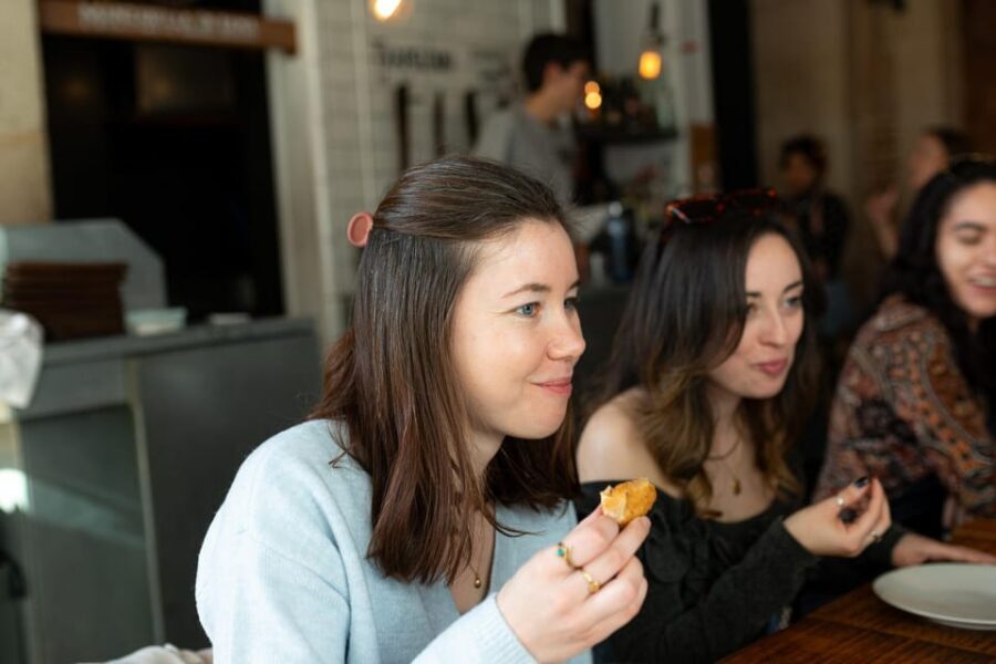 Barcelona: Tapas Tour with Food Tastings and Drinks - Walking through landmarks: Roman ruins to Santa Maria del Mar