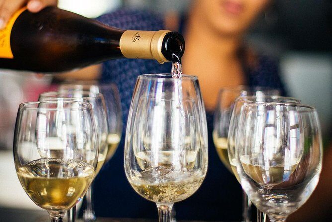 Barcelona With Locals: Wine and Tapas Private Tour - The wine tastings: Ros Marina White and Tempranillo red