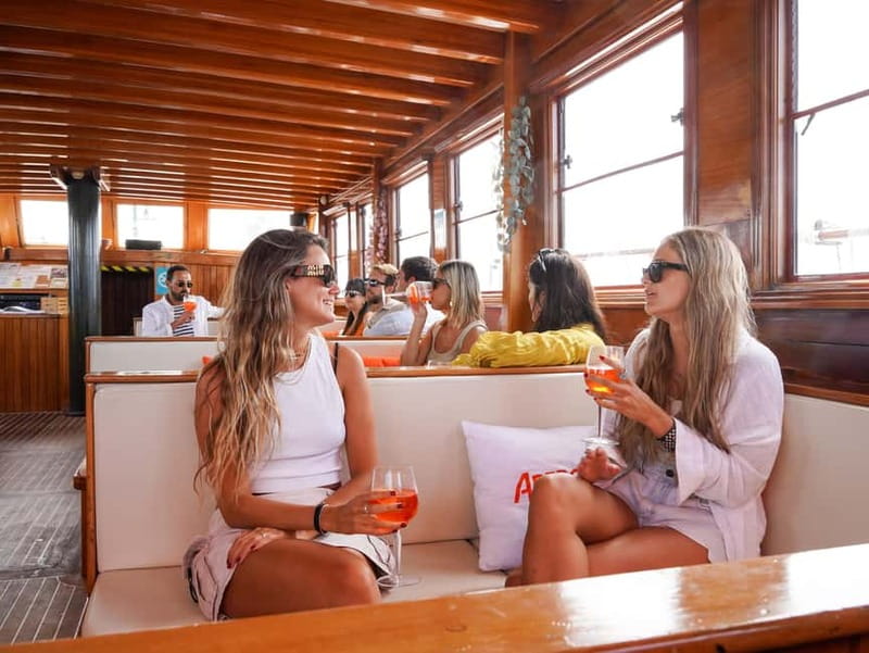 Barcelona: Wooden Boat Sailing with Tapa and Welcome Drink - Rooftop, lounge, and aft chill out: choose your “best seat”