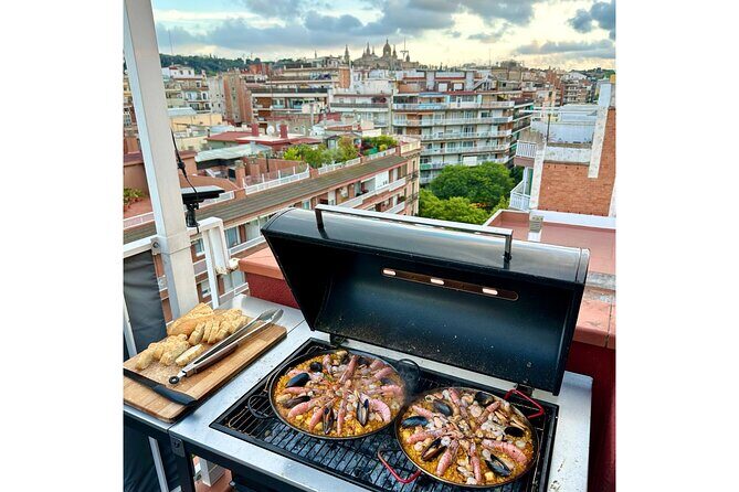 BBQ Paella in a Penthouse Terrace in Barcelona with a Chef - How the paella actually works over charcoal