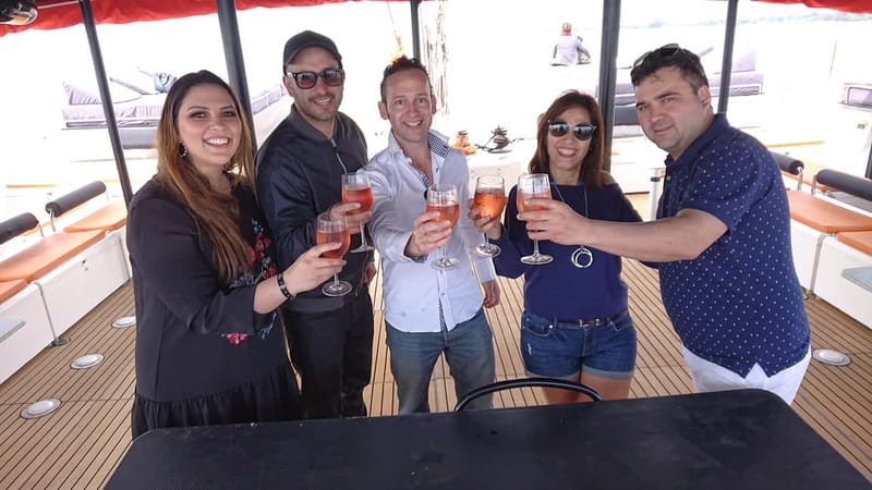 Cambrils/Salou: Coastline Catamaran 2h with drinks, pickup - Romanesque stone church and reservoir panoramas