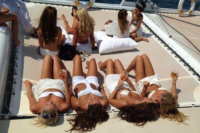 Catamaran trip with other groups along the Costa Brava. Saturday. - Sailing along Costa Brava, then anchoring in a swim-ready cove