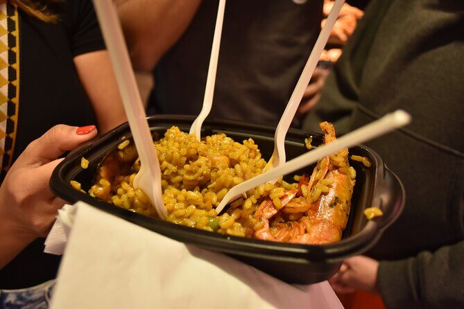 Cultural Walking Tour in Barcelona with Food & Wine Tasting - Mercat de la Boqueria: Ham and Paella in a Real Market Setting