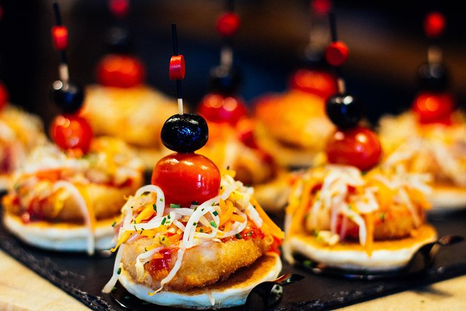 Drinks & Bites in El Born Private Tour - La Barceloneta stop: beach energy, then back to tasting