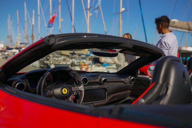 Ferrari Car Driving & Sailing Experience Barcelona - Parc Ciutadella: a quick pause with Olympic context