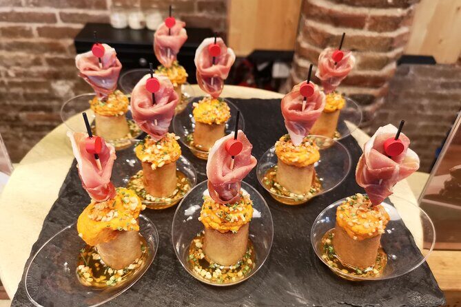Food & Drink Tasting Private Tour & Sagrada Familia Skip the Line - Sagrada Familia skip-the-line: audioguides, not a guided walk inside