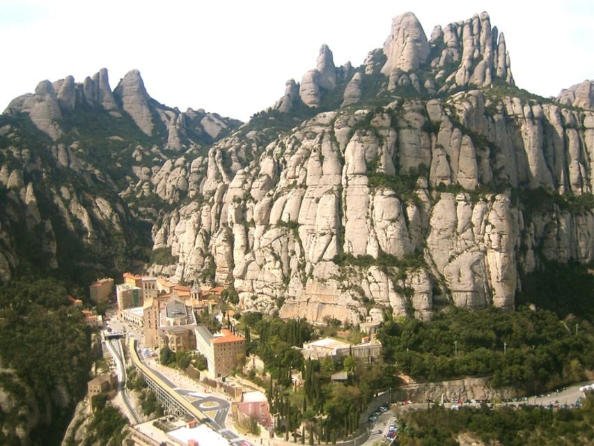 From Barcelona: Montserrat Full-Day Trip with Guided Hike - Getting back down: more shrines, then monastery again