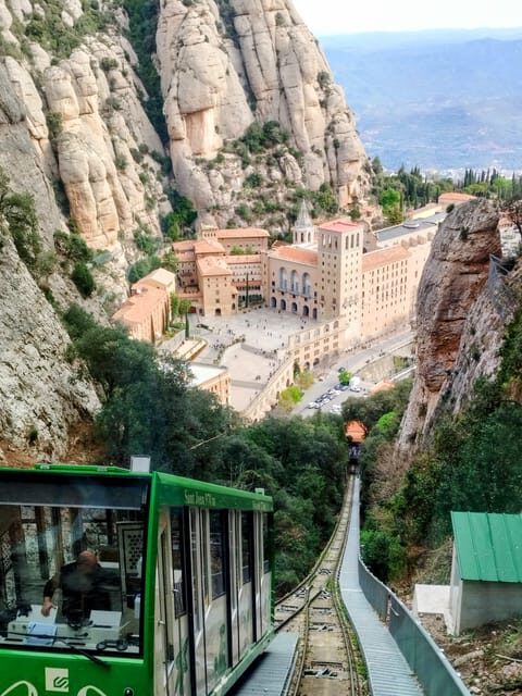 From Barcelona: Montserrat Private Guided Tour and Cable Car - The hotel pickup in an A/C minivan: easy start, clear rhythm