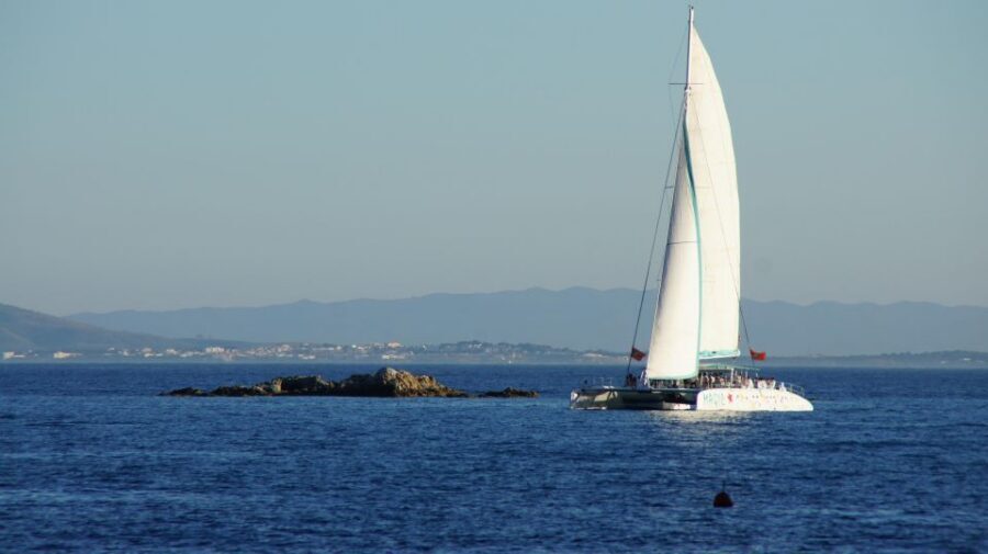 From Roses: Sunset Catamaran Cruise - What Happens on Board: Music, Sangria or Cava, and Slow Moments
