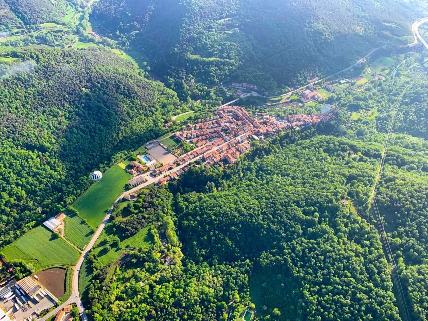 La Garrotxa Volcanoes Half-Day Hot Air Balloon Flight - Cava and a local pancake while the pilot navigates