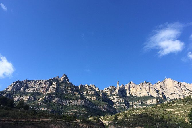 Montserrat & best winery private tour experience with a local expertise - Entering Montserrat Abbey: cloisters, the Madonna cabinet, and choir time