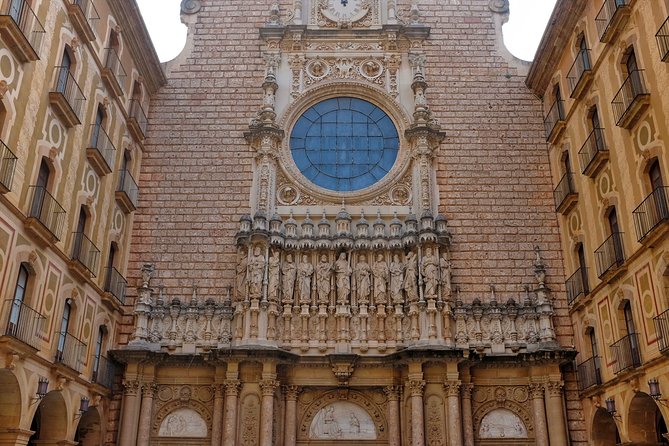 Montserrat Guided Tour with Cogwheel or Cable Car & Black Madonna - Your second Montserrat block: basilica time, grounds, and a market wander