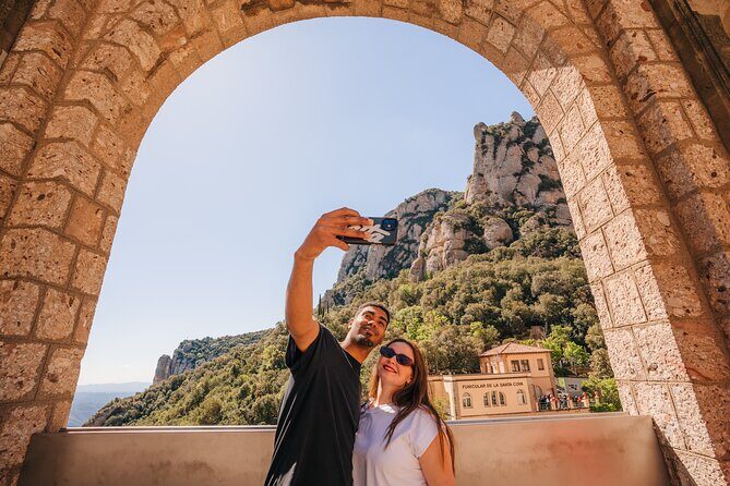 Montserrat Monastery Visit and Local Brunch from Barcelona - Montserrat Monastery: a working site with La Moreneta at the center
