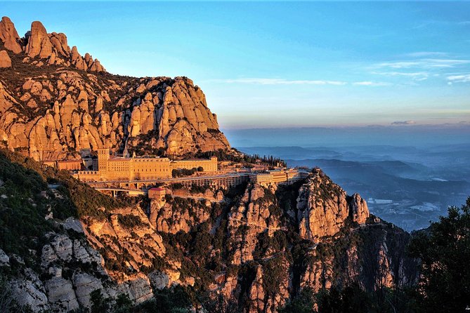 Montserrat Monastery with Easy Hike & Sitges Tour from Barcelona - Inside and outside Montserrat: what the guided time actually buys you