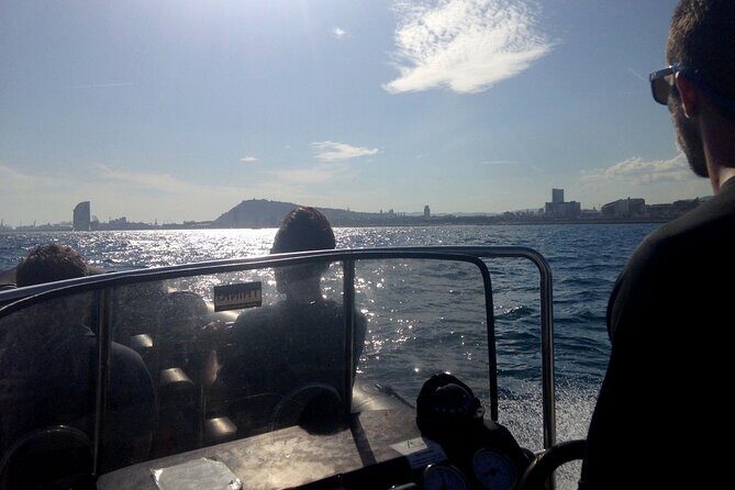 One-hour High-Speed Powerboat Ride - Port Vell: super yachts, Columbus Statue, and America’s Cup bases