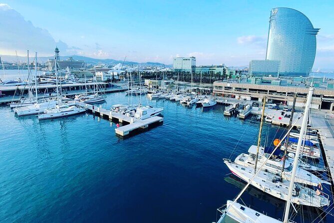 One-hour High-Speed Powerboat Ride - Throttle open: Port Olímpic approach, W Hotel, and Barceloneta views