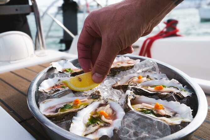 Oyster Odyssey Barcelona's Premier Sailing and Seafood Adventure - A Barcelona oyster cruise that trades traffic for sea breeze