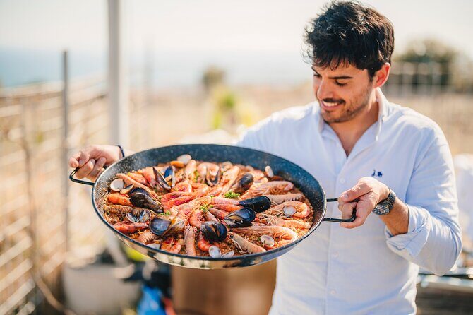 Paella Cooking Experience & Winery Tour from Barcelona - The paella cooking class: hands-on, not just watching